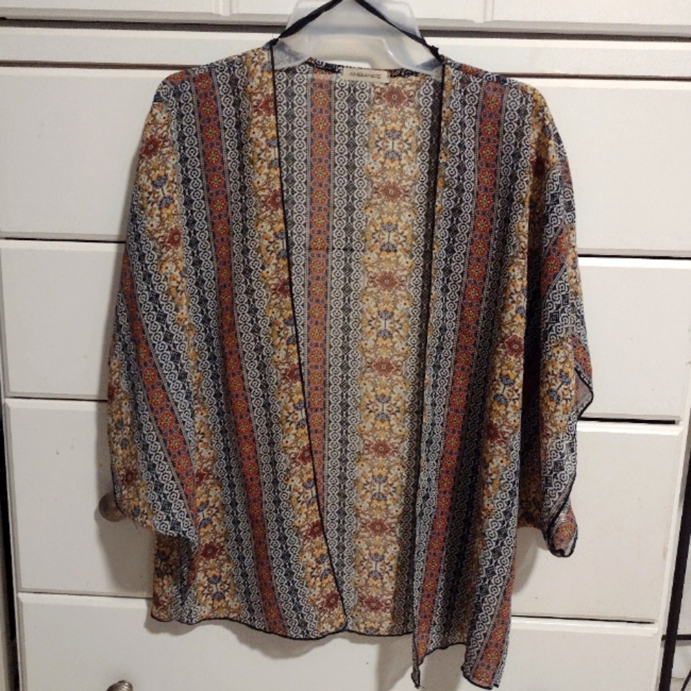 Women's scarf type shawl with sleeves
